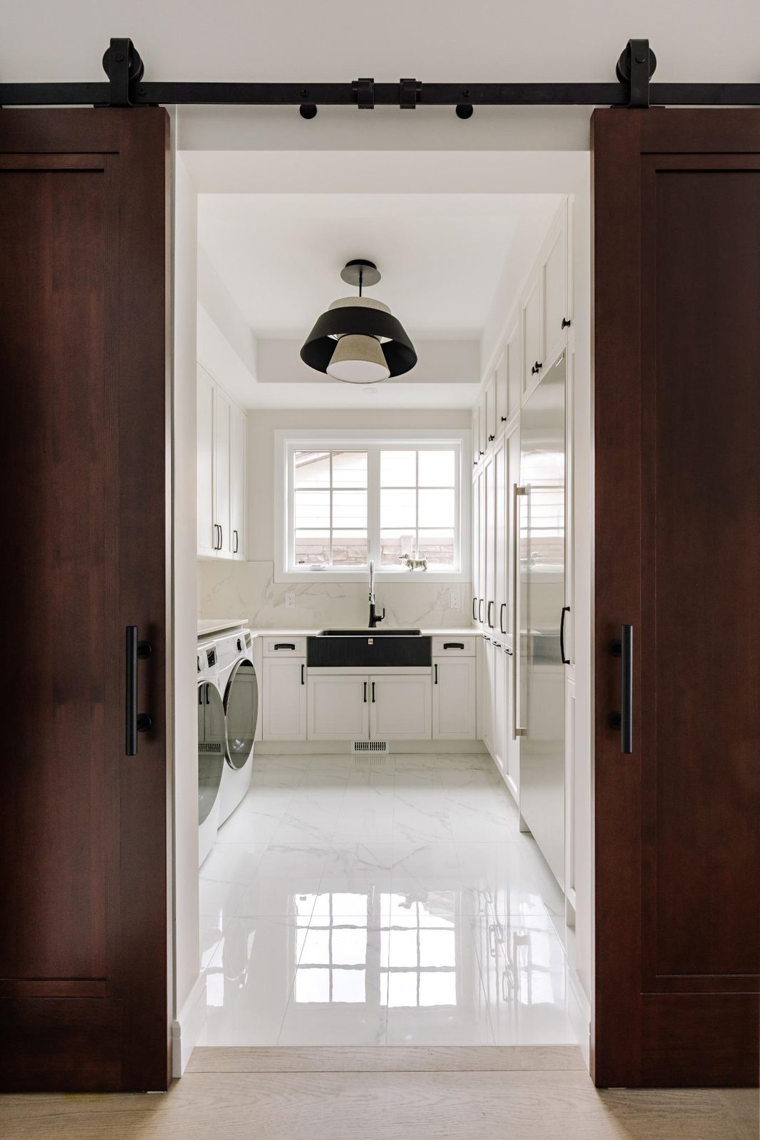 Laundry millwork with barn doors