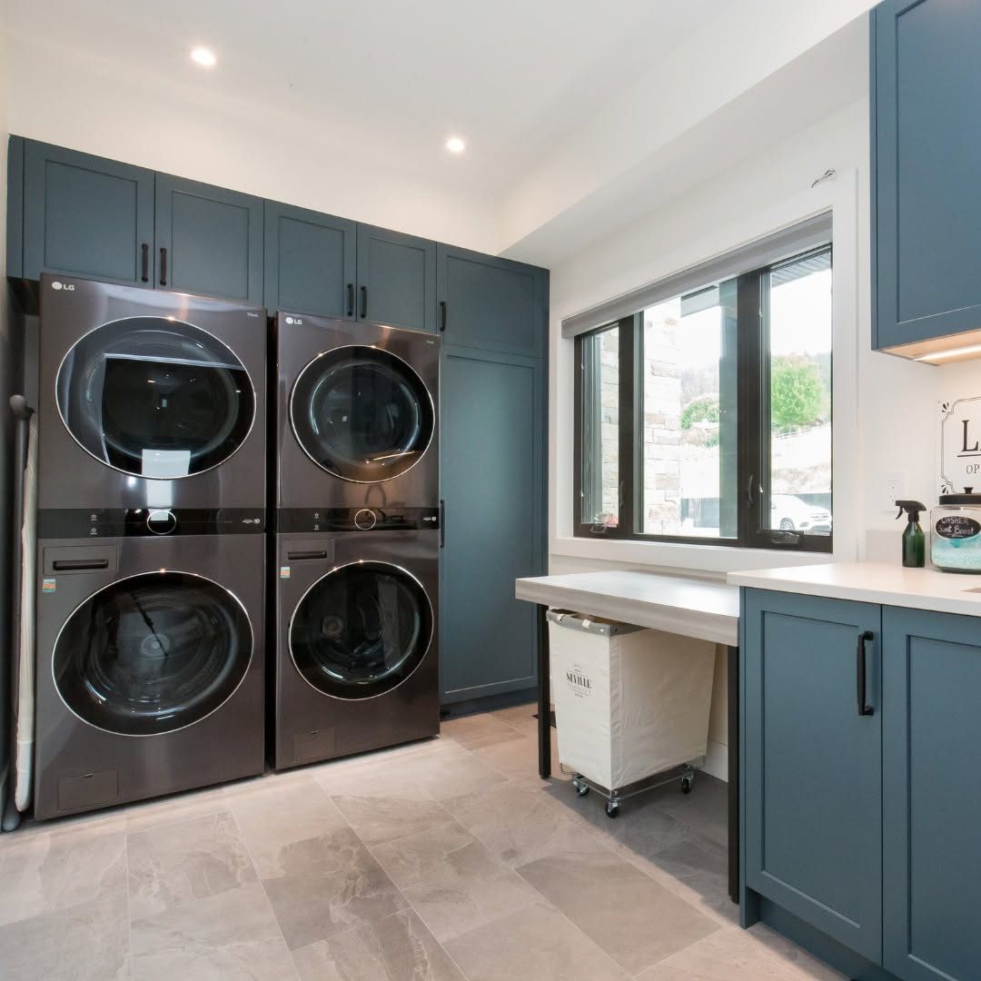 Blue stacked laundry millwork