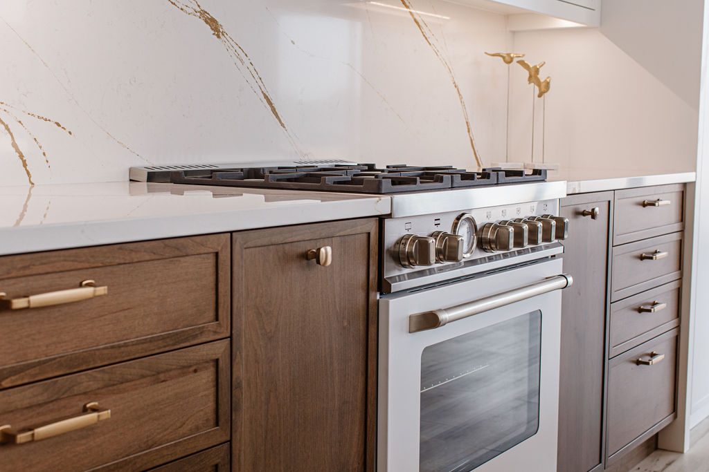 Walnut millwork with professional range