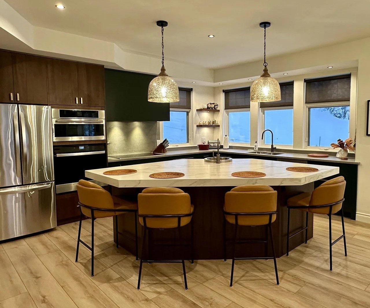 Dark millwork kitchen with leather stools
